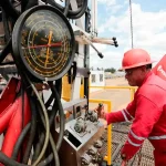 A Venezuelan oil worker operates a drill. Photo: PDVSA.