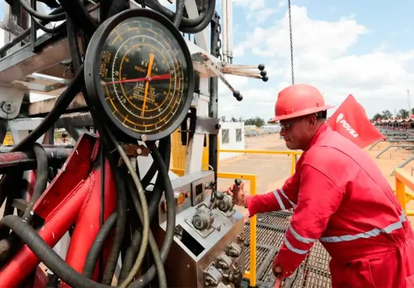 A Venezuelan oil worker operates a drill. Photo: PDVSA.