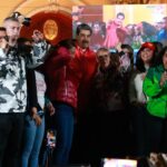 President of Venezuela, Nicolás Maduro, is observed surrounded by supporters, celebrating the election of governors and deputies at a government event early Monday, in Caracas, Venezuela. Photo: Presidential Press.