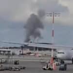 Smoke rises after a Yemeni missile strike on Ben Gurion Airport in Tel Aviv, May 4, 2025. Photo: social media/video grab.
