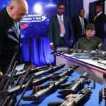 Venezuelan Interior Minister Diosdado Cabello examining a set of military grade automatic weapons, seized in the most recent terrorist plot thwarted by intelligence agencies in Venezuela. Photo: Venezuelan Interior Ministry.
