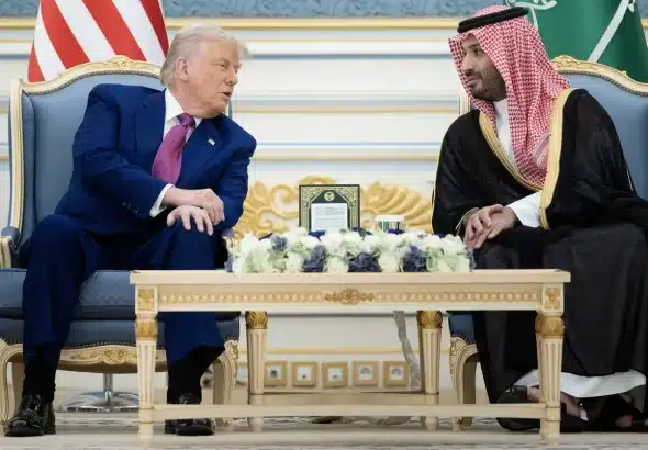 US President Donald Trump and Saudi Crown Prince Mohammed Bin Salman talk before a coffee ceremony at the Royal Court in Riyadh on 13 May, 2025. Photo: AFP.