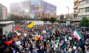 People gather in Tehran’s Revolution Square to protest against US illegal bombing of Iranian nuclear sites. Sunday, June 22, 2025. Photo: Iranian Presidential Press.