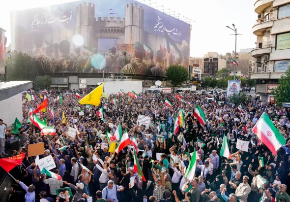 People gather in Tehran’s Revolution Square to protest against US illegal bombing of Iranian nuclear sites. Sunday, June 22, 2025. Photo: Iranian Presidential Press.