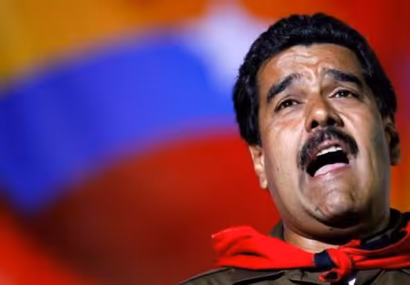 Nicolas Maduro sings during a campaign rally in Caracas, Venezuela, April 5, 2013. Photo: Carlos Garcia.