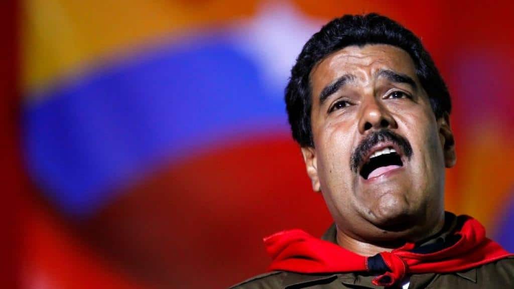 Nicolas Maduro sings during a campaign rally in Caracas, Venezuela, April 5, 2013. Photo: Carlos Garcia.