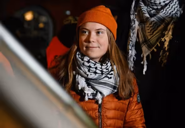 Greta Thunberg stands at a pro-Palestinian demonstration on the market square at the stage entrance in Manhattan, New York, December 6, 2024. Photo: MintPress News.
