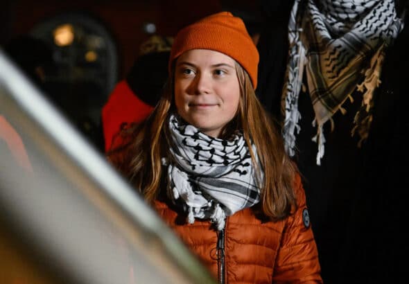 Greta Thunberg stands at a pro-Palestinian demonstration on the market square at the stage entrance in Manhattan, New York, December 6, 2024. Photo: MintPress News.