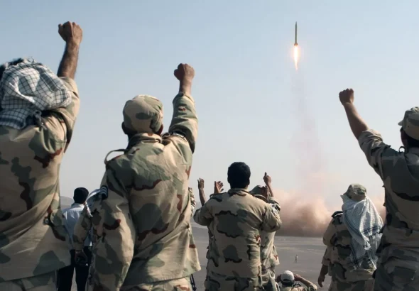 Iranians cheer a missile launch. Photo: IRNA/Mostafa Qotbi.