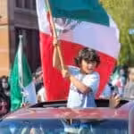 A child holds the Mexican flag in an anti-ICE protest in Los Angeles. Photo: PSL.