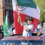 A child holds the Mexican flag in an anti-ICE protest in Los Angeles. Photo: PSL.