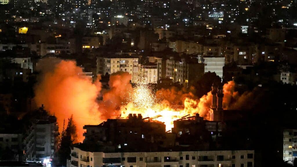 Smoke and fire erupt from the site of an Israeli airstrike on Beirut's southern suburbs on June 5. Photo: Ibrahim Amro/AFP/Getty Images.