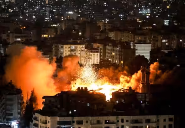 Smoke and fire erupt from the site of an Israeli airstrike on Beirut's southern suburbs on June 5. Photo: Ibrahim Amro/AFP/Getty Images.
