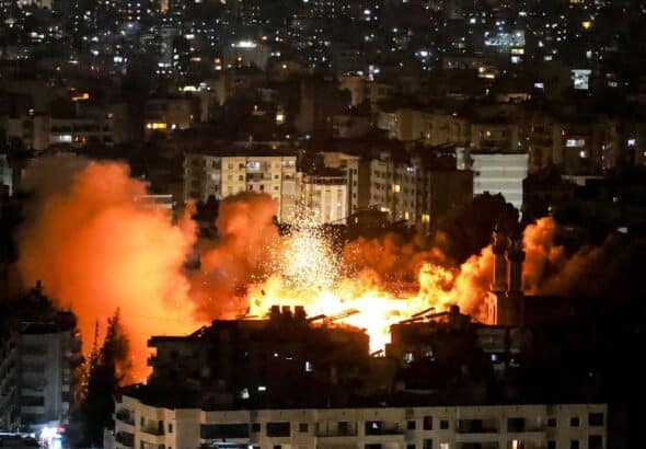 Smoke and fire erupt from the site of an Israeli airstrike on Beirut's southern suburbs on June 5. Photo: Ibrahim Amro/AFP/Getty Images.