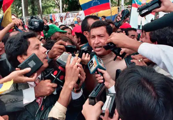 “I’m going to the catacombs with the people”: Under amnisty, Hugo Chavez, the political prisoner, leaves his cell in Yare on March 27, 1994. Photo: AFP.