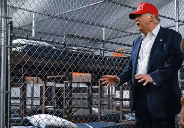 President Donald Trump tours a immigration jail, dubbed "Alligator Alcatraz," located at the site of the Dade-Collier Training and Transition Airport in Ochopee, Florida, on July 1, 2025. Photo: Andrew Caballero-Reynolds/AFP.