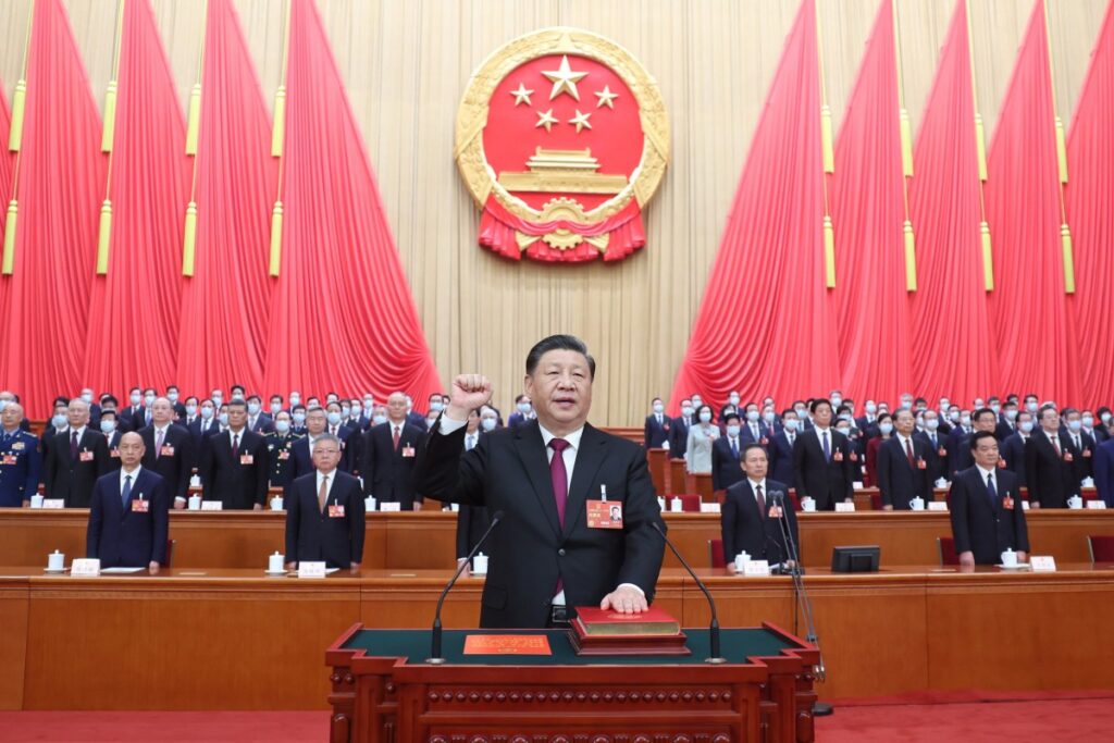 President Xi Jinping pledging allegiance to the constitution at the Great Hall of the People in Beijing in 2023. Photo: Xinhua.