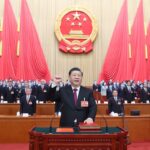 President Xi Jinping pledging allegiance to the constitution at the Great Hall of the People in Beijing in 2023. Photo: Xinhua.
