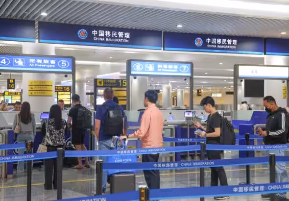 International passengers line up for documents checking at Chongqing Jiangbei International Airport in southwest China's Chongqing, July 8, 2025. Photo: Xinhua/Huang Wei.