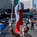 Erik "Neat" Martinez marches along US Route 101 during a protest against arrests and deportations of migrants by US government agencies in Los Angeles, California, February 2, 2025. Photo: Joel Angel Juarez/Reuters.