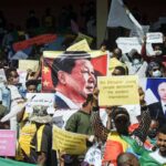 A portrait of China’s President Xi Jinping seen on a demonstration in Ethiopia. Photo: Amanuel Sileshi/AFP/file photo.