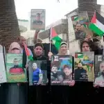 Palestinian demonstrators take part in a protest in solidarity with Palestinian prisoners in Israeli jails in Nablus, West Bank, May 13, 2025. Photo: Mohammed Nasser/Apaimages.