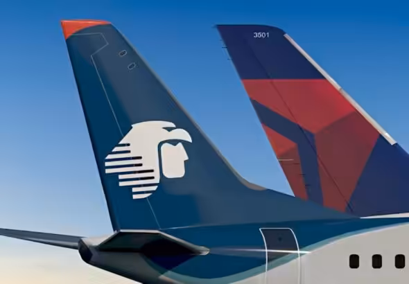 Tails of Delta and Aeromexico passenger jets. File photo.
