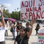 Anti-gentrification protestors in Mexico City hold signs demanding urgent real estate regulation, July 4, 2025. Photo: Fernando Llano/AP.