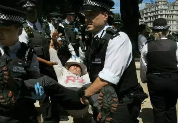 Police arrest a protester during a pro-Palestine demonstration in London, July 12, 2025. Photo: Martin Pope/Getty Images.