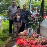 Nicaraguan revolutionary Sócrates’ sister Abigail (in front), son Edwin and daughter Paola, at his grave on June 28, 2025. Photo: John Perry.
