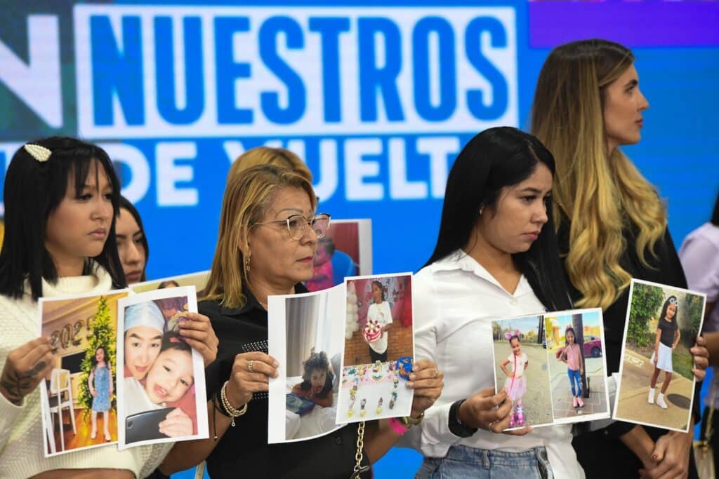 Family members of Venezuelan children abducted by the US authorities hold their photos at a press conference in the National Assembly of Venezuela, in Caracas, June 30, 2025. Photo: Xinhua/Marcos Salgado.