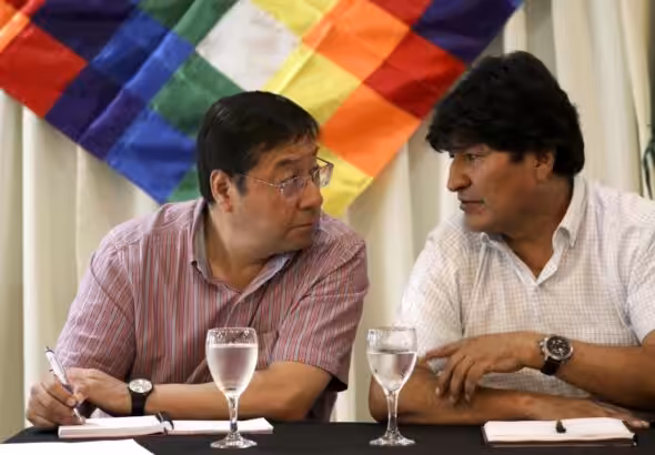 Luis Arce (left) and Evo Morales (right) during a meeting in 2020. Photo: AP/file photo.