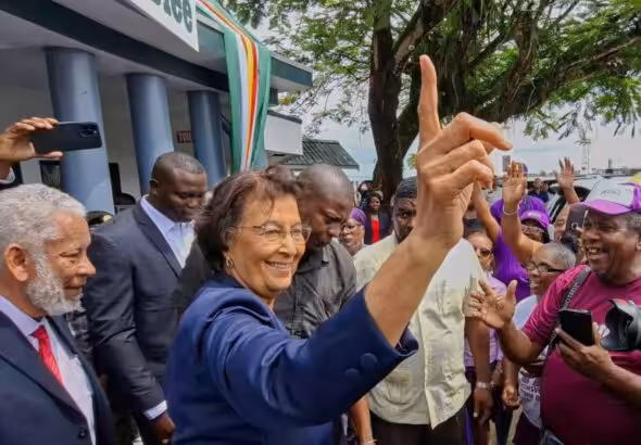 Jennifer Geerlings-Simons (center) greets well-wishers in Paramaribo after parliament appoints her as Suriname’s first female president. Photo: AP.