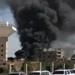 Black smoke billows in the distance on July 15, 2025 near Sweida, Syria. Photo: X.