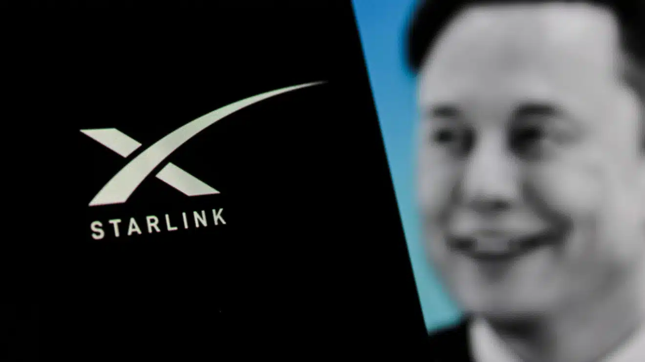 In this photo illustration, the X Starlink logo is displayed on a smartphone with Elon Musk’s profile in the background. Photo: Algi Febri Sugita /AP.