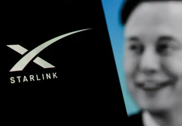 In this photo illustration, the X Starlink logo is displayed on a smartphone with Elon Musk’s profile in the background. Photo: Algi Febri Sugita /AP.