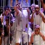 Venezuelan actors re-enacting the scene of Venezuelan migrants abducted and sent to the CECOT prison in El Salvador. Photo: Venezuelan Culture Ministry.