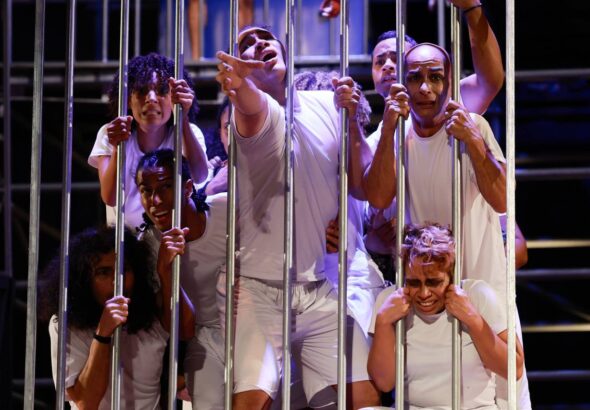 Venezuelan actors re-enacting the scene of Venezuelan migrants abducted and sent to the CECOT prison in El Salvador. Photo: Venezuelan Culture Ministry.