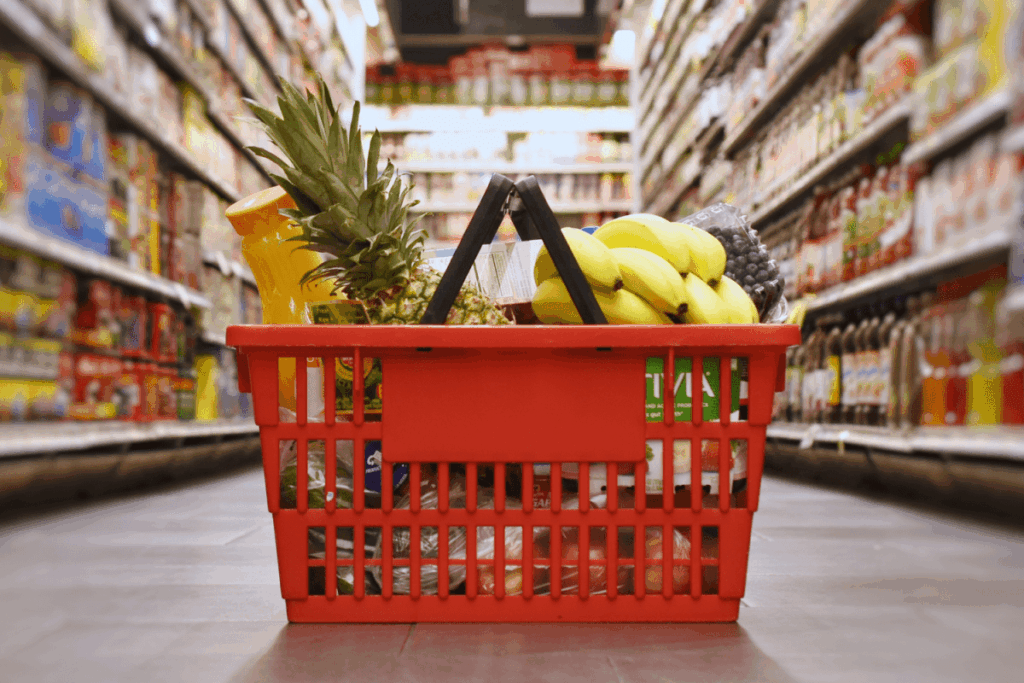 Grocery hand basket on a grocery store isle. File photo.
