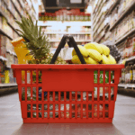 Grocery hand basket on a grocery store isle. File photo.