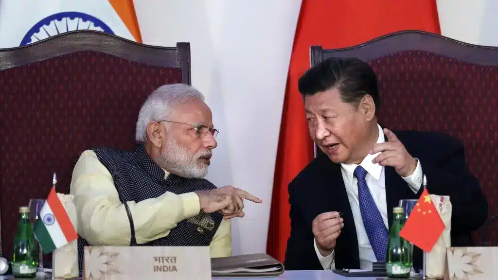 Indian Prime Minister Narendra Modi, left, talking with Chinese President Xi Jinping in 2016. Photo: AP/Manish Swarup.