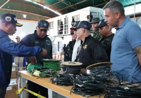Venezuelan Interior Minister Diosdado Cabello and personnel of state security agencies review some of the explosive material seized from a warehouse in Anzoátegui state. Photo: Con El Mazo Dando