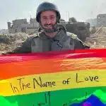 “Israeli” soldier Yoav Atzmoni that was posted on Instagram by the Israeli government in November 2023 with the caption: “The first ever pride flag raised in Gaza”. Photo: IG/@stateofisrael.