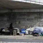Homeless people under a bridge in Washington, DC. Photo: TRT World.