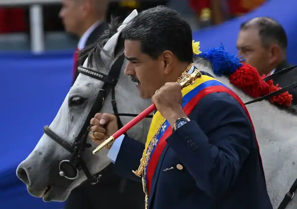 Venezuelan President Nicolás Maduro carries the presidential baton at an event, July 2024. Photo: Federico Parra/AFP.