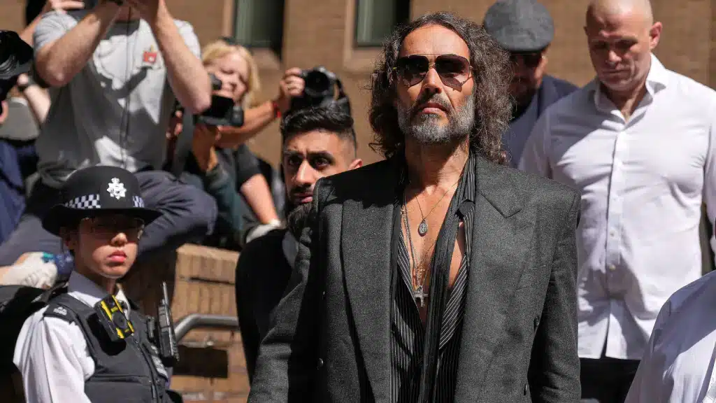 English comedian and actor Russell Brand leaves Southwark Crown Court where he is charged with rape and sexual assault in London, Friday, May 30, 2025. Photo: Alastair Grant/AP Photo.