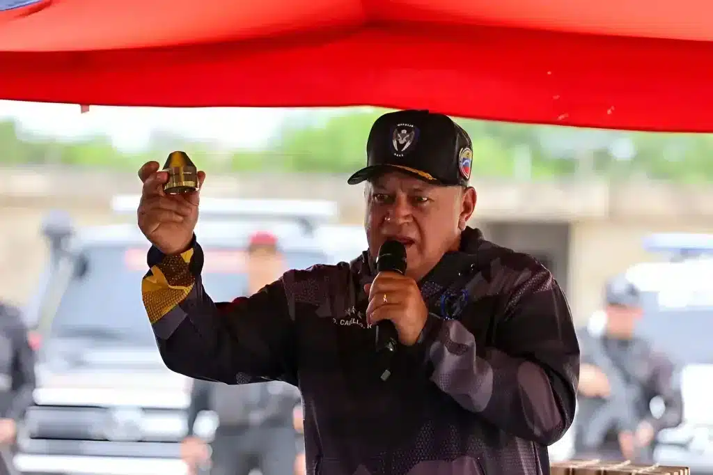 Venezuelan Interior Minister Diosdado Cabello holds up a shaped charge that is used to provide more killing power to explosives. The element was part of a shipment of explosives seized in Maturín, Monagas state, August 9, 2025. Photos: IG/@minjusticia_ve.