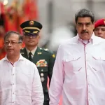 Colombian President Gustavo Petro, left, with Venezuela’s President Nicolás Maduro being saluted by the Presidential Honor Guard at Miraflores Palace, Caracas, in October 2022. Photo: Rayner Pena/Shutterstock/file photo.