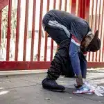 A man in San Francisco stands doubled over, a position taken by many users while under the influence of opioids such as fentanyl. Photo: Stephen Lam/The Chronicle/file photo.