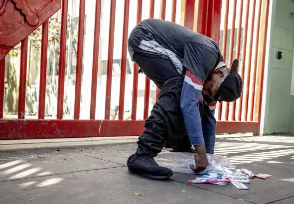 A man in San Francisco stands doubled over, a position taken by many users while under the influence of opioids such as fentanyl. Photo: Stephen Lam/The Chronicle/file photo.